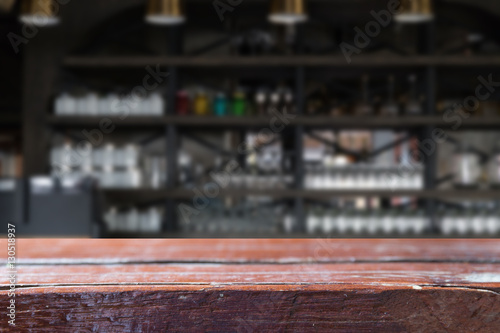 glass on counter bar in restaurant interior blur background with