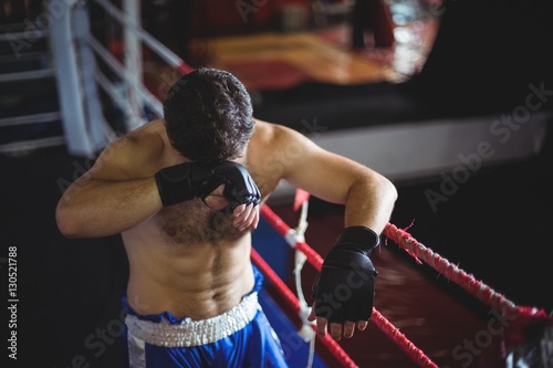 Obraz na plátně Boxer posing after defeat