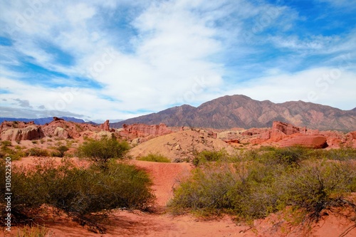 Impressions of the Canyon Quebrada de las Conchas with walls of rock displaying a multitude of red hues close to Cafayate in Chile, South America