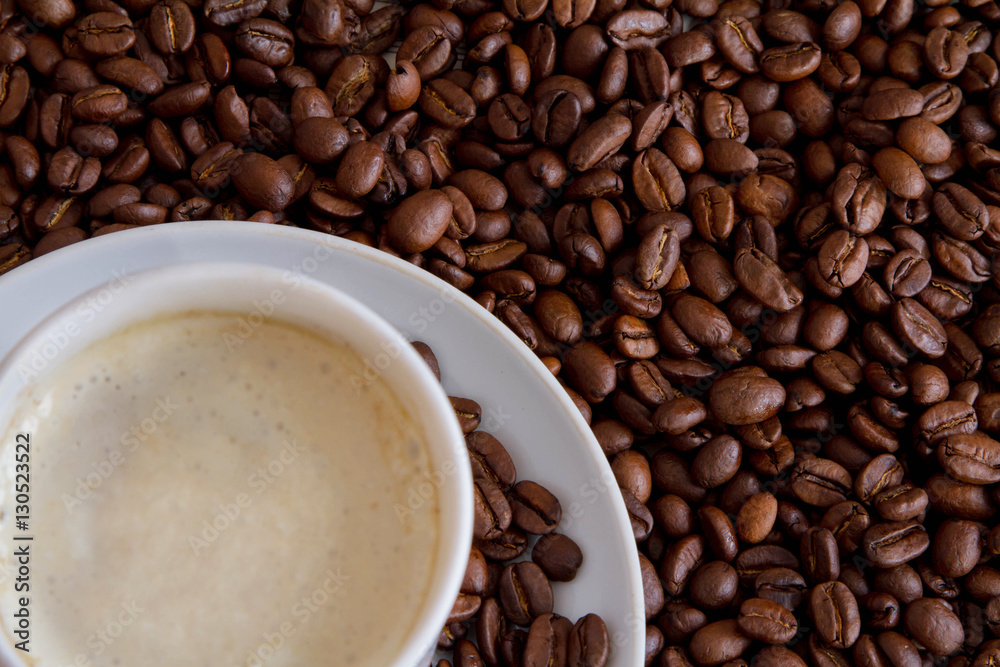 Fototapeta premium white cup and coffee beans