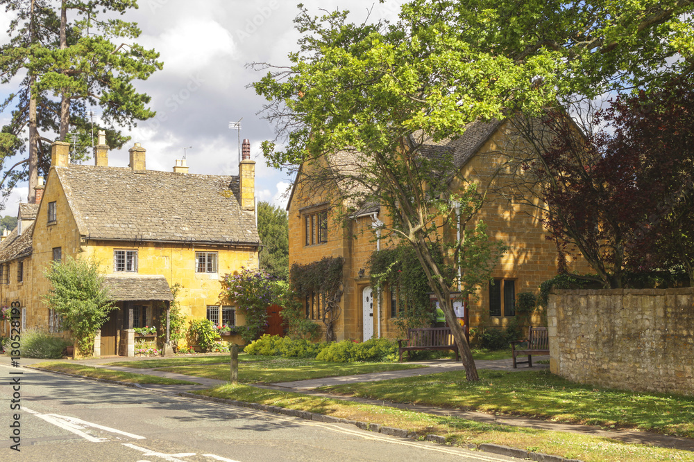 A sunny street in the Cotswolds, England
