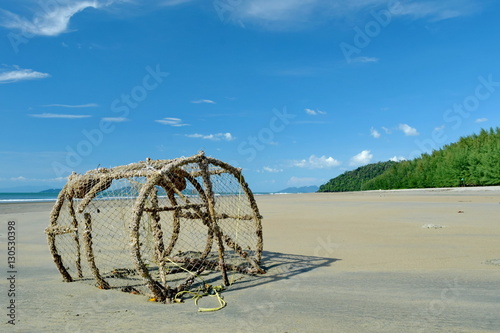 trap-basket-on-the-sea-shore and blue sky.