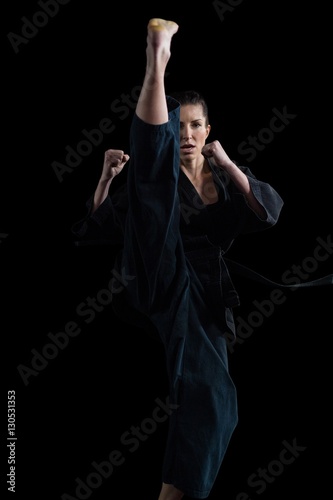 Female karate player performing karate stance
