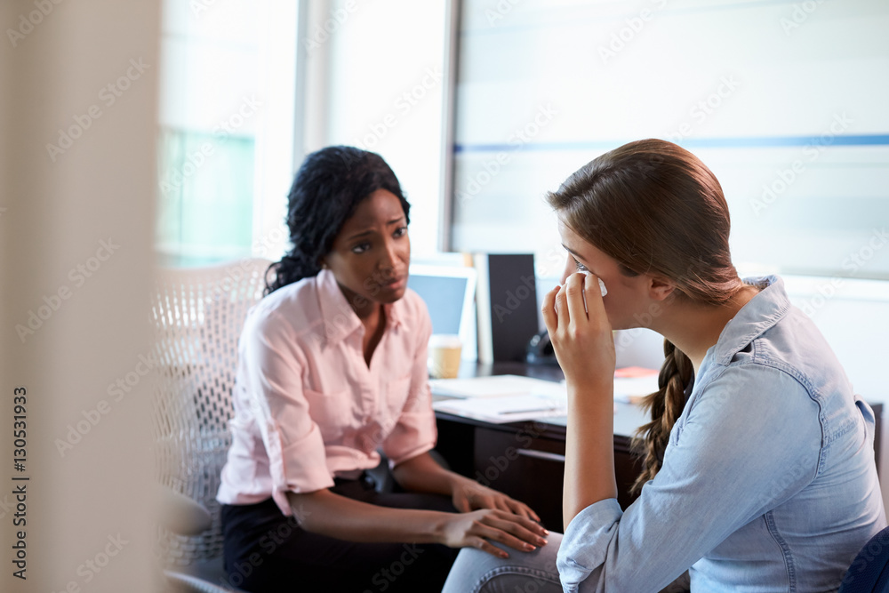 Doctor In Consultation With Depressed Female Patient Doctor In Consultation With Depressed Female Patient