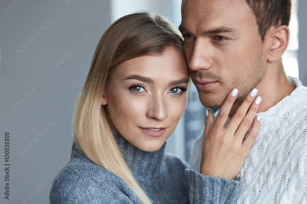 Care. Portrait Of Beautiful Young Couple, Woman And Man Indoors Care. Portrait Of Beautiful Young Couple, Woman And Man Indoors