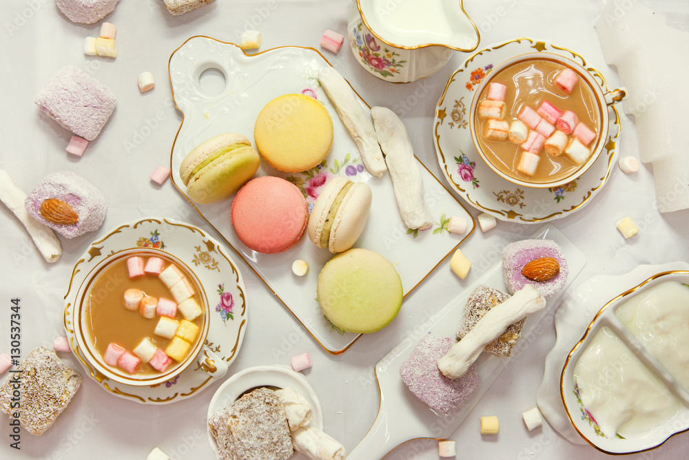 Winter table appointments with macaroons and sweets Winter table appointments with macaroons and sweets