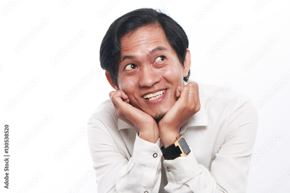Happy Young Asian Businessman Thinking Happy Young Asian Businessman Thinking