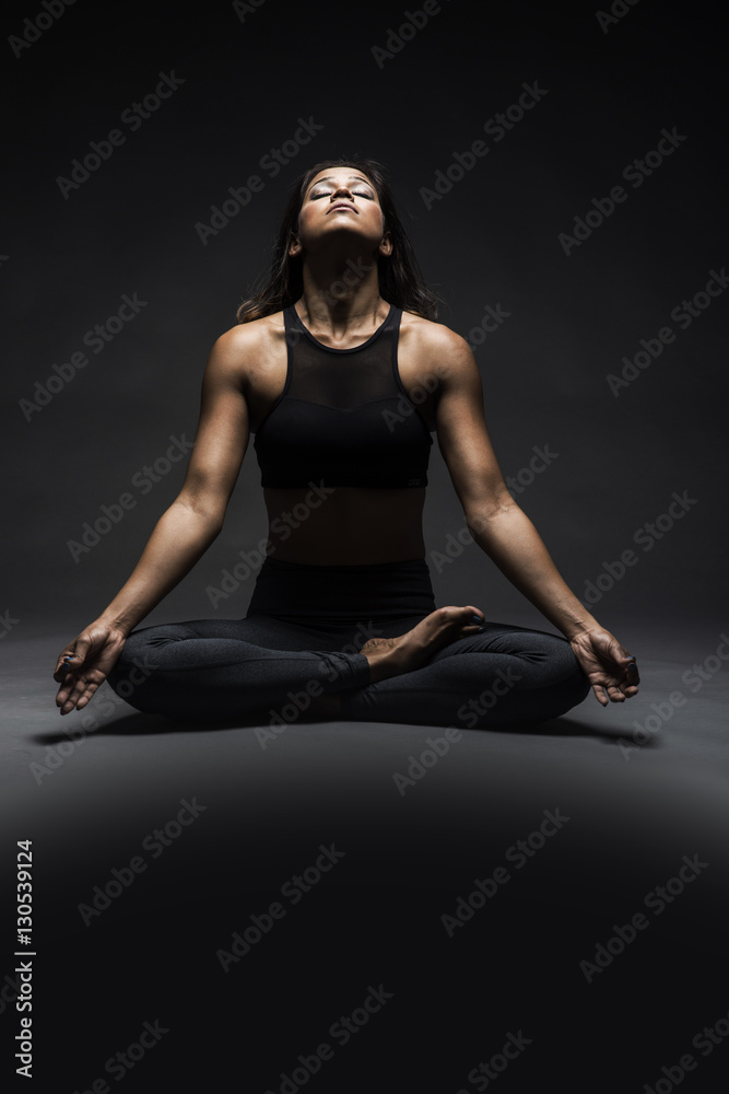 Beautiful Indian woman in yoga pose