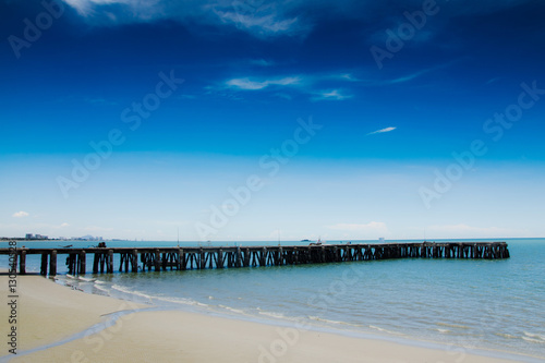 Beautiful sea blue sky jetty with soft focus. Feeling happy