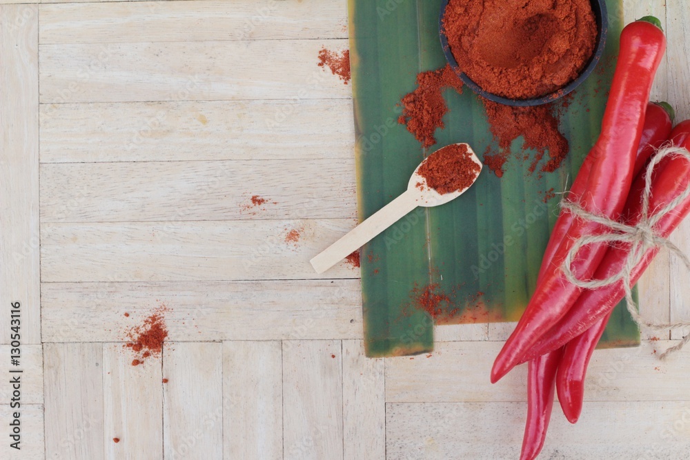 Spicy paprika powder hot peppers and fresh chili.