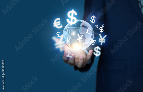 Financial symbols coming from hand.The concept of global business .