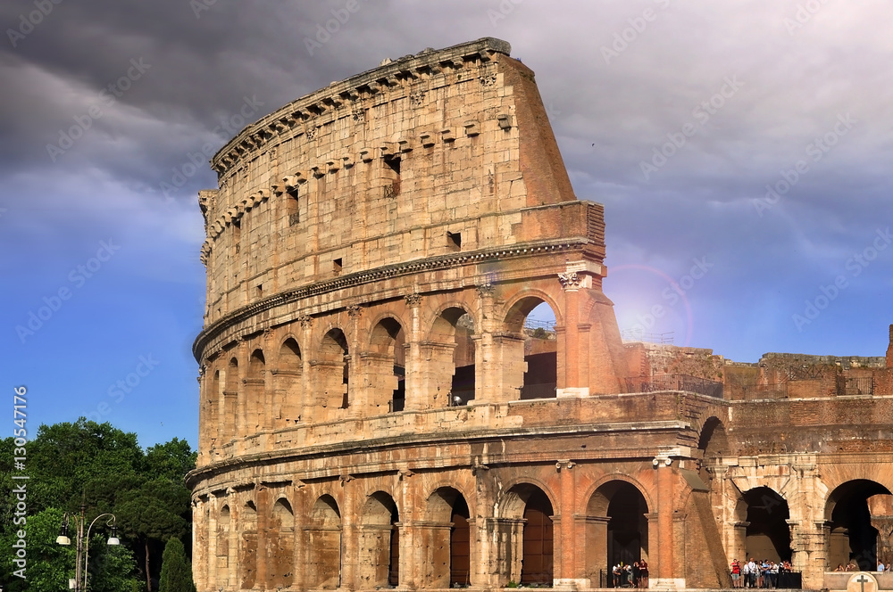 View of Colosseum in Rome during the evening sunset  in Italy