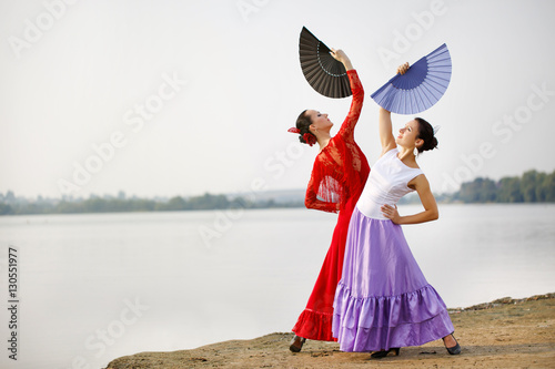 Flamenco dancers Spain womans in a long dress