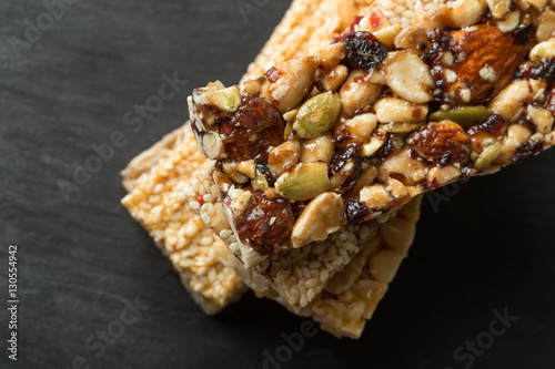 different granola bars on a slate plate