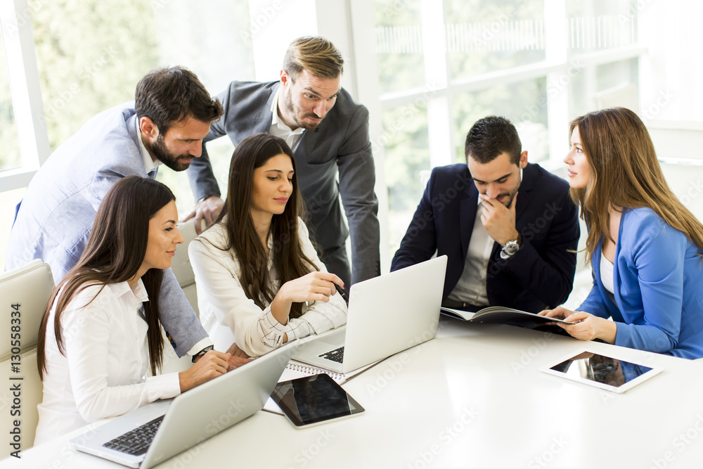 Young business people keeping team building in a modern office