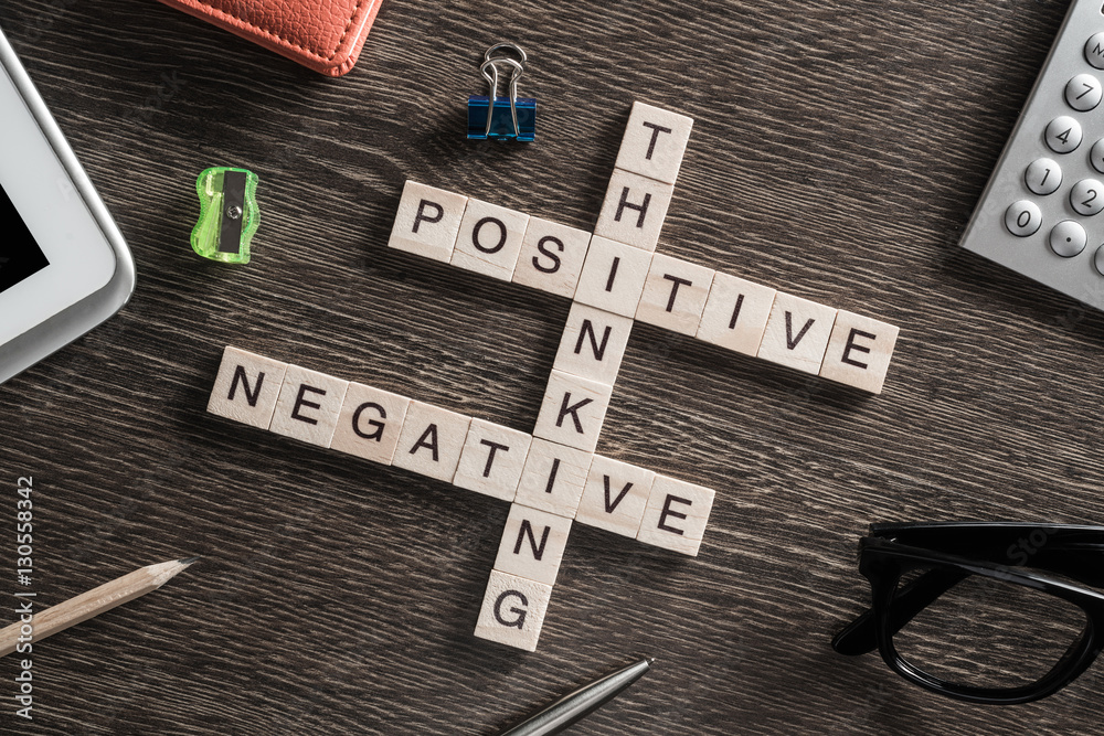 Obraz premium Conceptual business keywords on table with elements of game making crossword