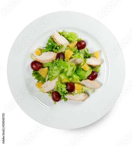 salad with grapes and chicken slices isolated on the white backg