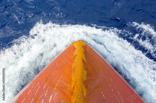 Rusty bulb in the blue ocean.