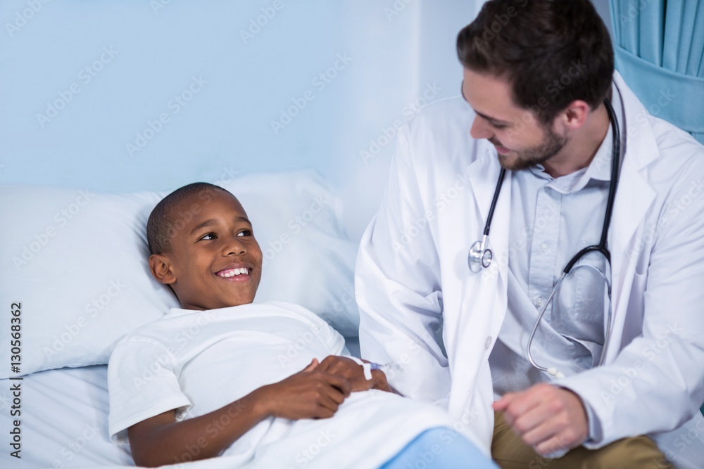 Doctor interacting with patient Doctor interacting with patient