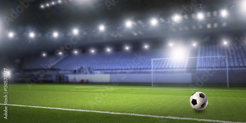 Soccer stadium in spotlights . Mixed media