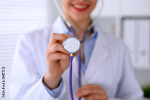Doctor with a stethoscope in the hands