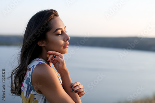 beautiful girl enjoying wind and breathing