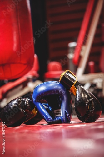 Boxing headgear and pair of gloves