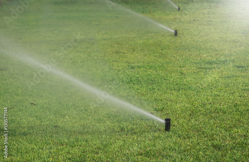 water springler in grass Field