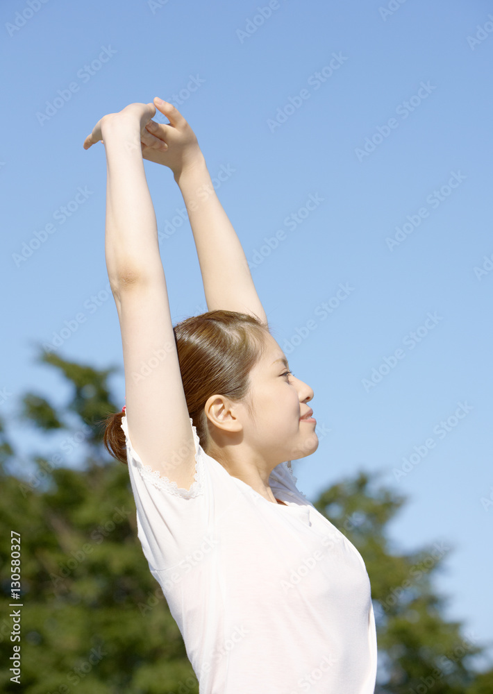 A young woman stretching