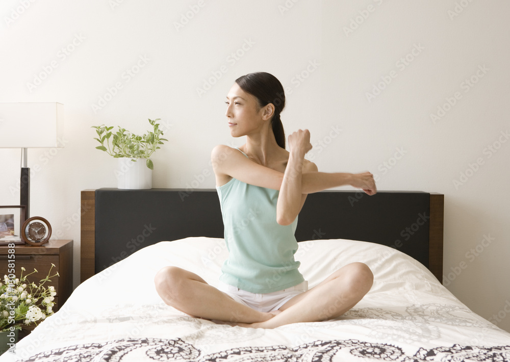 A woman stretching A woman stretching