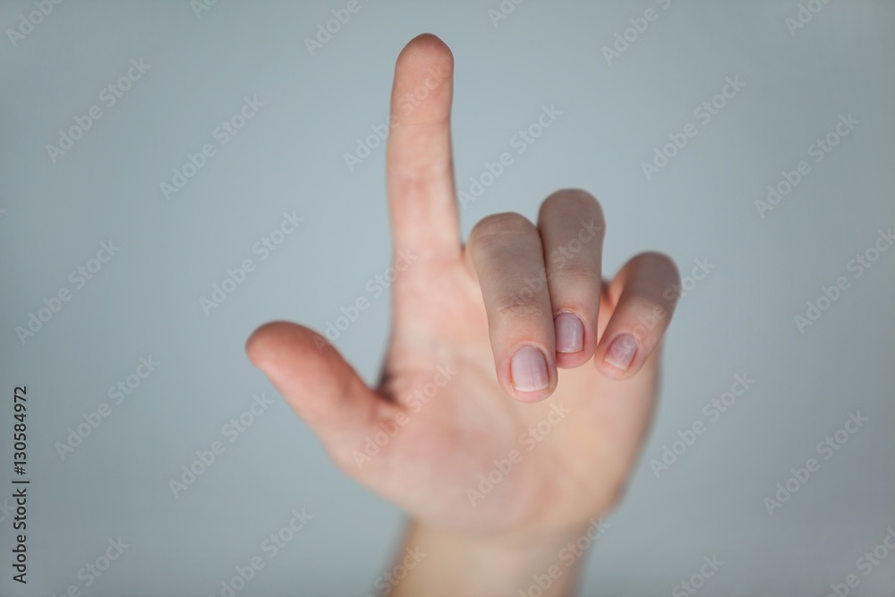 Hand of a woman pointing upwards Hand of a woman pointing upwards