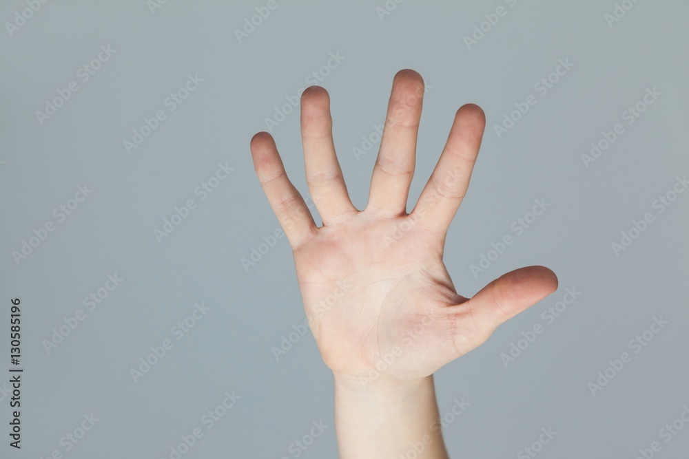 Hand of a woman touching an invisible screen Hand of a woman touching an invisible screen