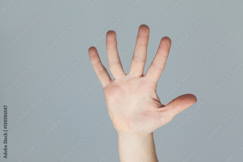 Hand of a woman touching an invisible screen Hand of a woman touching an invisible screen