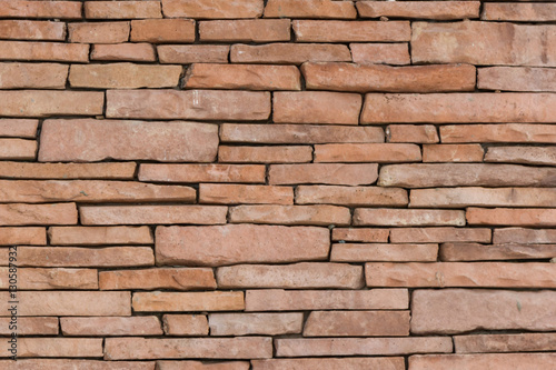 Wall lined with stone inlay