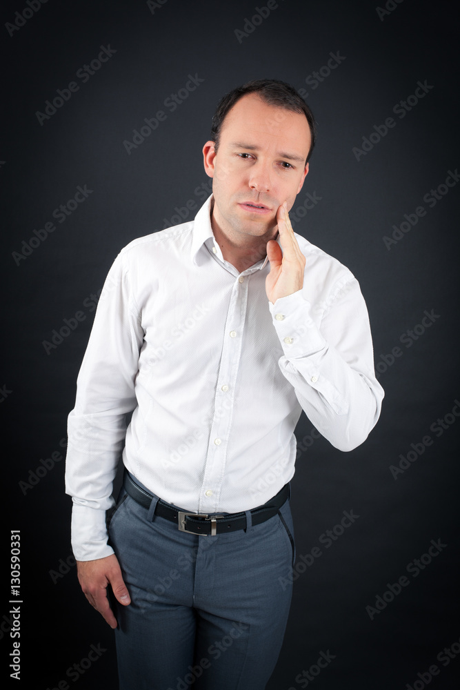 Handsome Man doing different expressions in different sets of clothes: toothache Handsome Man doing different expressions in different sets of clothes: toothache
