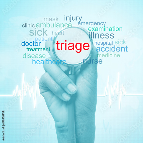 hand holding stethoscope with triage word. medical concept photo