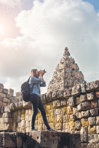 Young attractive woman photographer tourist.