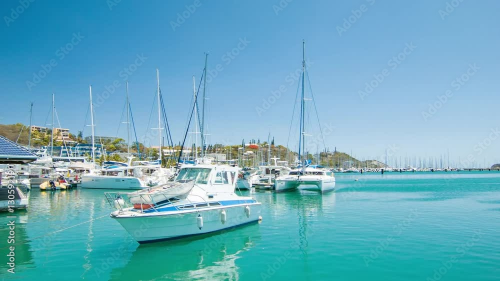 Generic Unmarked Boats and Yachts in Nouméa New Caledonia Tropical Port Moselle Marina with Exotic Turquoise Blue Water Generic Unmarked Boats and Yachts in Nouméa New Caledonia Tropical Port Moselle Marina with Exotic Turquoise Blue Water