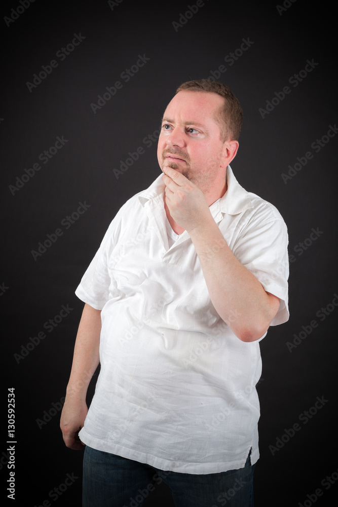 Handsome man doing different expressions in different sets of clothes: thinking Handsome man doing different expressions in different sets of clothes: thinking