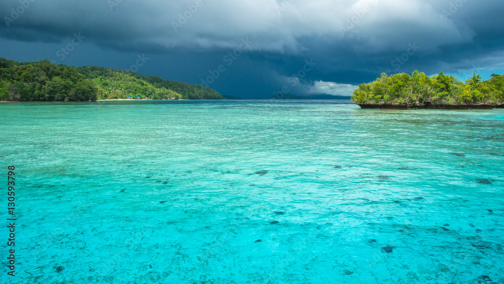Beautiful Blue Lagoone shortly before Thunderstorm begining, Gam Island, West Papuan, Raja Ampat, Indonesia