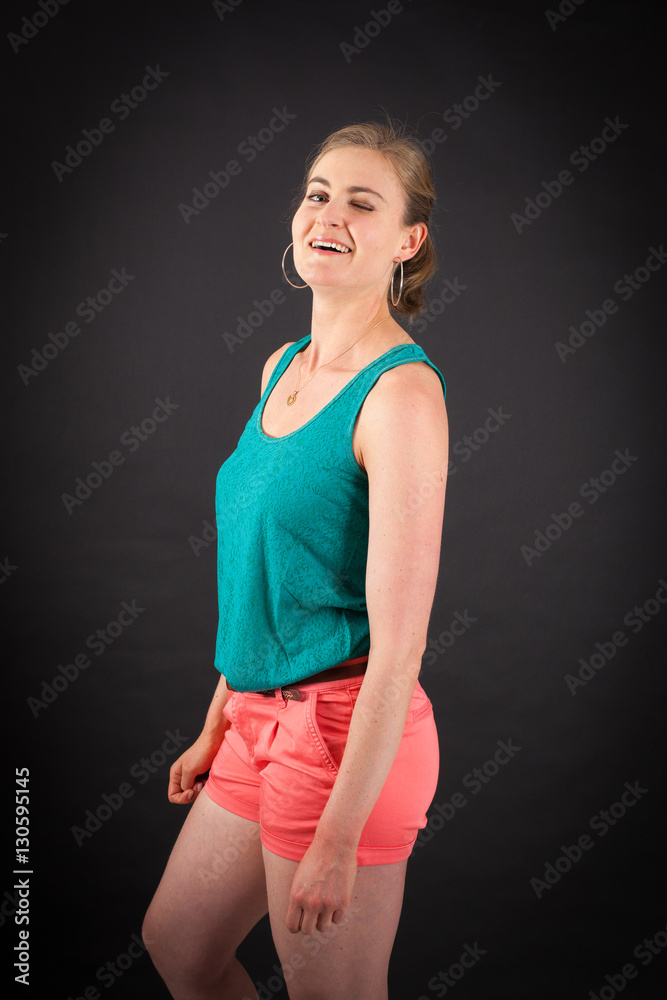 Beautiful woman doing different expressions in different sets of clothes: bwink Beautiful woman doing different expressions in different sets of clothes: bwink