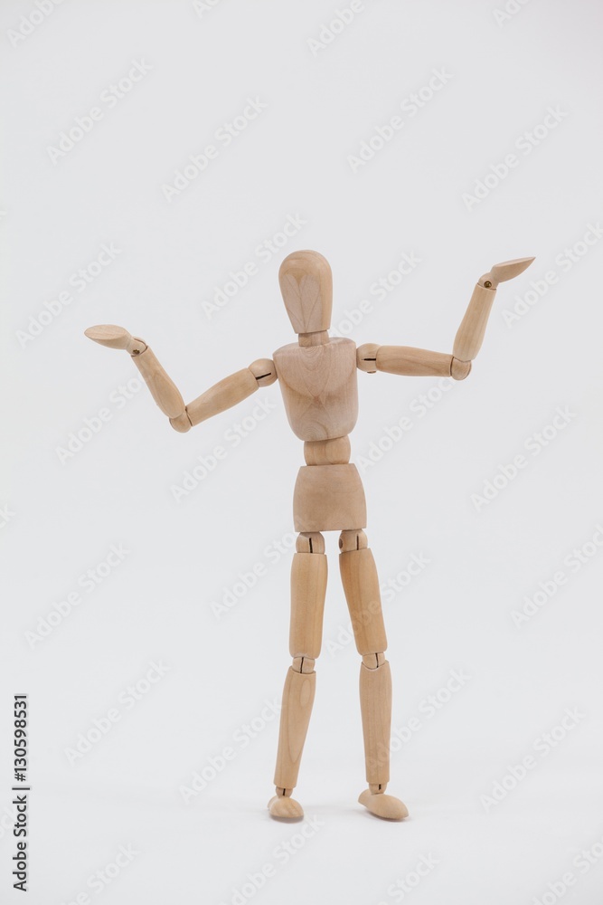 Wooden figurine standing with arms spread Wooden figurine standing with arms spread