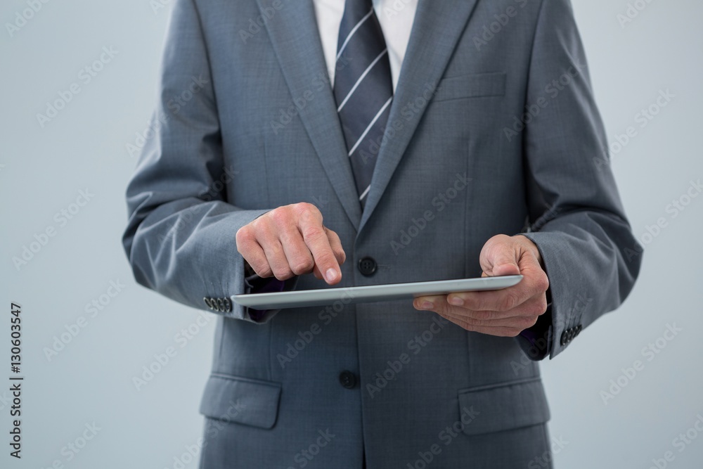 Businessman using digital tablet Businessman using digital tablet