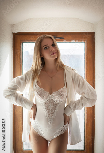Beautiful seductive woman in underwear and a white shirt. Free Download Beautiful seductive woman in underwear and a white shirt. - GFXLoad