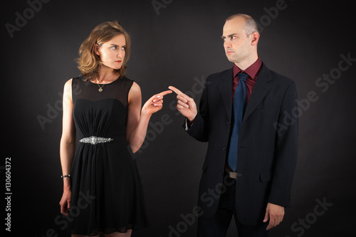 Beautiful couple doing different expressions in different sets of clothes: be careful