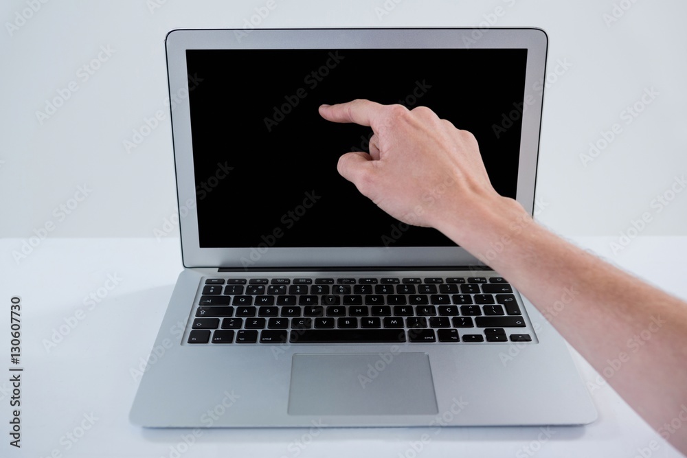 Man pointing at laptop Man pointing at laptop