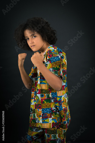 Handsome boy doing different expressions in different sets of clothes: boxe