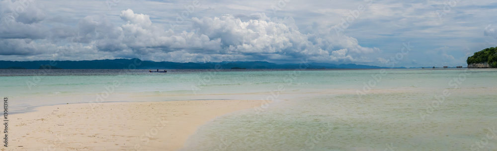 Sandy Bank on Kri Island, Low Tide, Gam in Background. Raja Ampat, Indonesia, West Papua