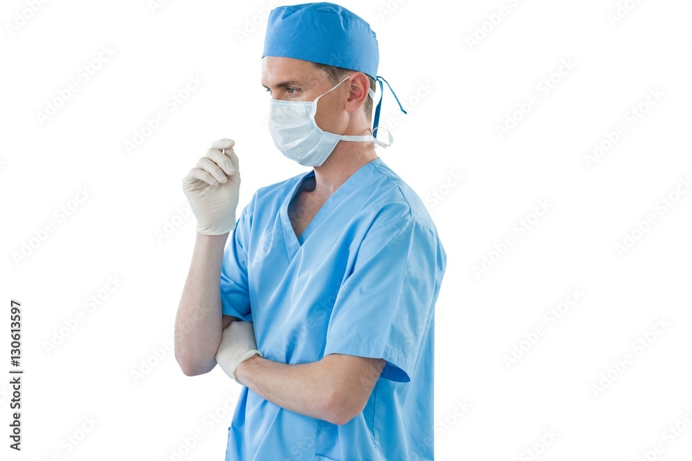 Male nurse wearing surgical mask and gloves