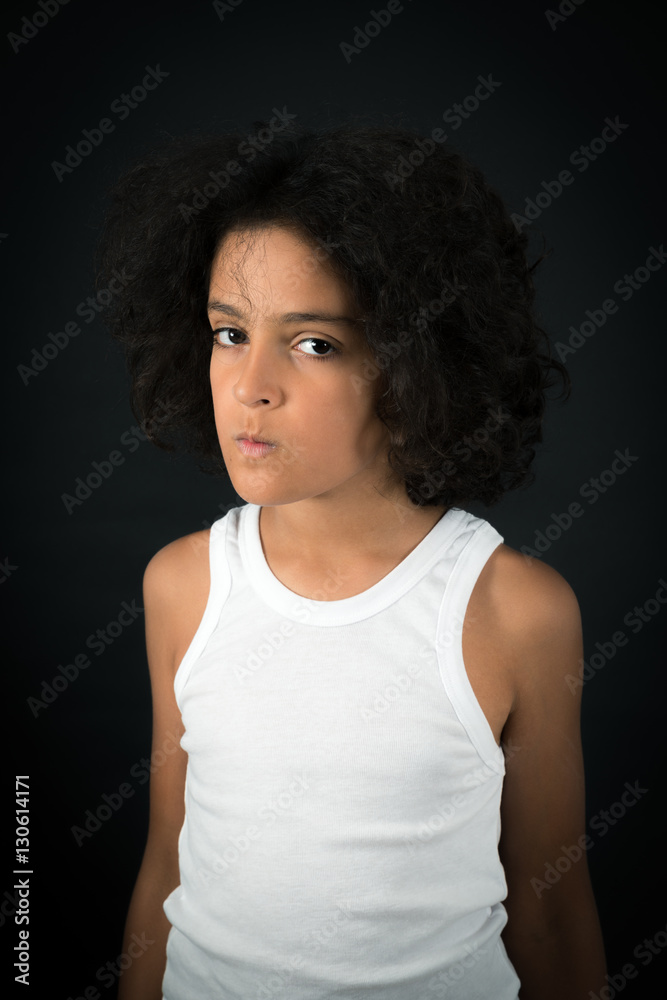 Handsome boy doing different expressions in different sets of clothes: angry Handsome boy doing different expressions in different sets of clothes: angry